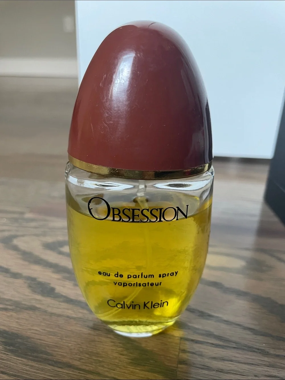 Calvin Klein Obsession Perfume Bottle in Yellow and Brown - Picture 2 of 2